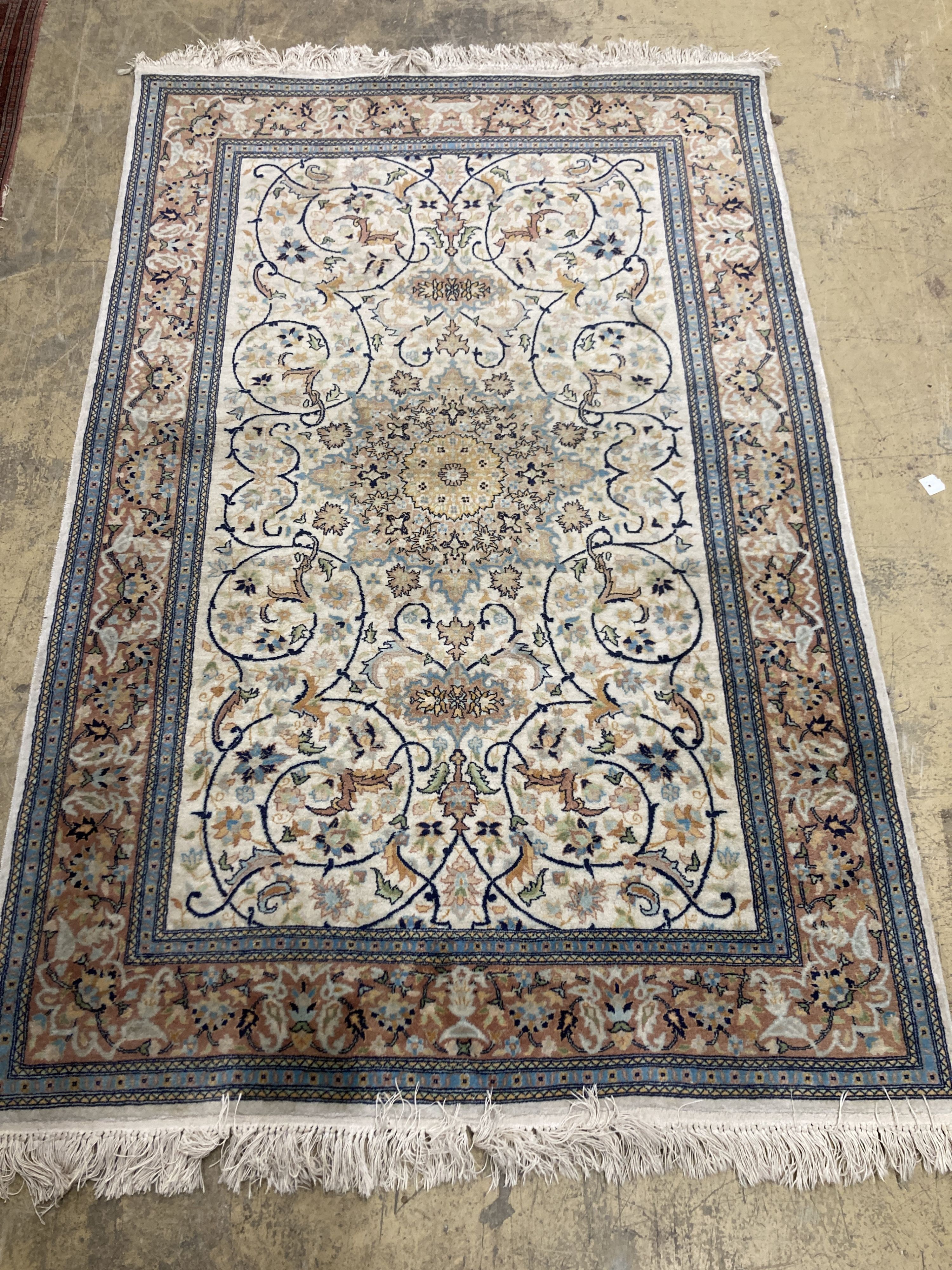A North West Persian design ivory ground rug, 210 x 136cm